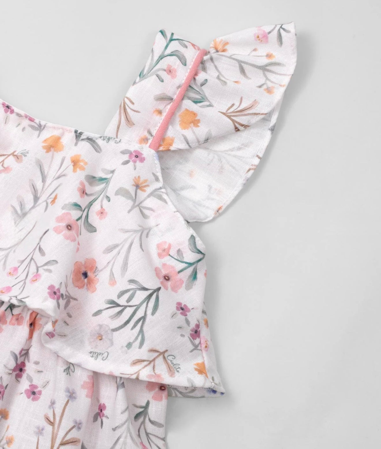 Floral print linen dress with boleros and buttons on the back for girls