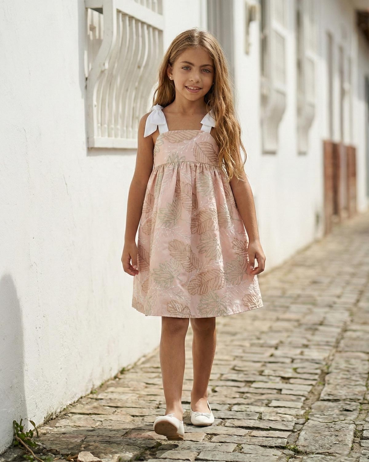 Dress with delicate leaf embroidery and white bow straps