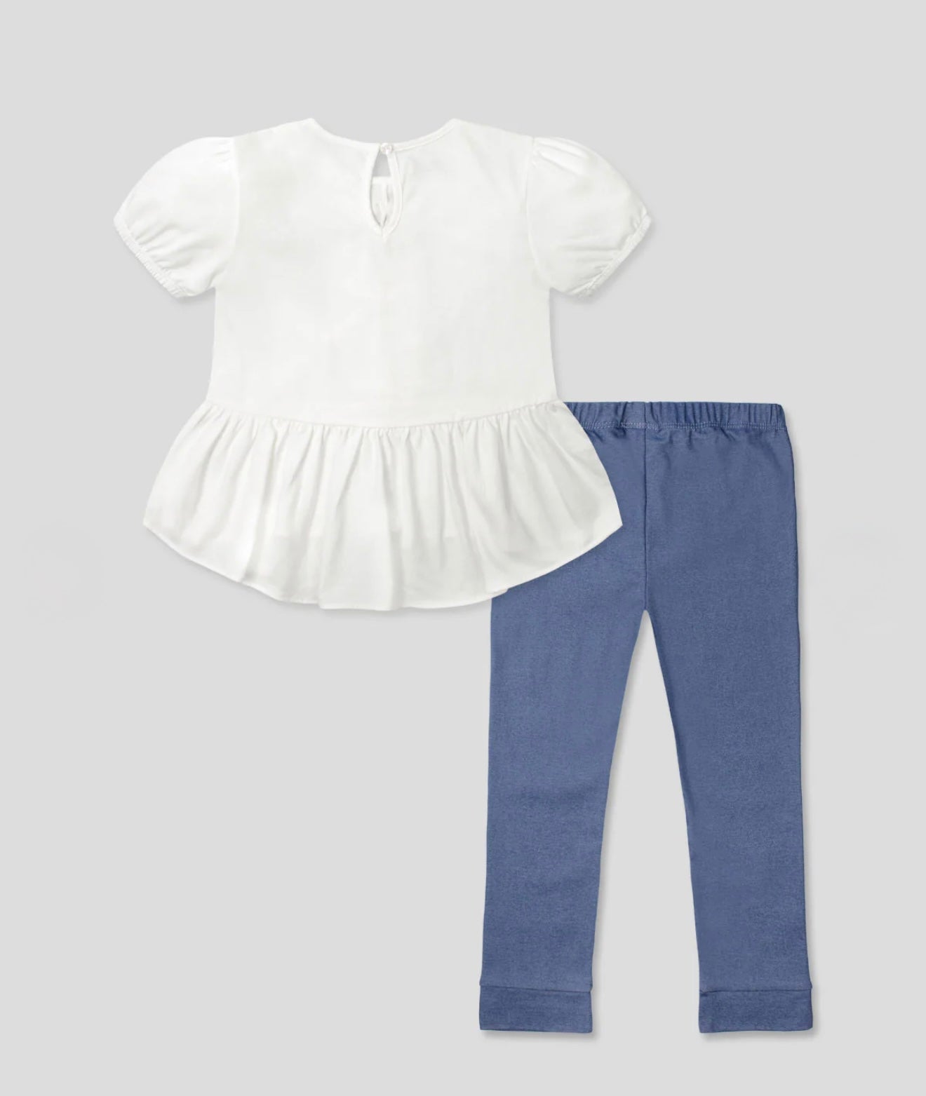 White blouse set with bow detail, finished with a bolero and blue leggings for girls